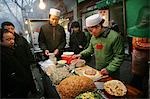 A street stall selling food in the Muslim Quarter,Xian,Xi'an,Capital of Shaanxi Province,China