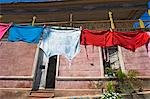 Washing drying on clothes line outside house,Cayo Granma,Santiago Bay,Cuba