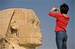 Woman taking photo of Sphinx,Giza,Cairo,Egypt