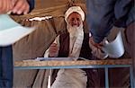 Taliban official checks papers,Iran