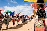 Hmong girls in traditional costume throwing tennis balls at a courting ceremony at the New Year festival,Phonsavan,Laos