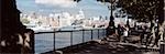 People walking along the Thames Path near the South Bank Centre towards St Pauls Cathedral and the city,London,UK.