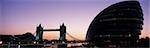 Looking down the Thames before dawn towards Tower Bridge and the Greater London Assembly Office,London,UK.