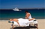 Woman getting massaged,Pacific Coast,Mexico