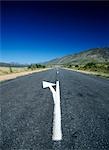 Arrow road marking in the Little Karoo near Garcia,Western Cape,South Africa.