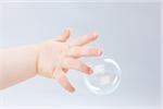 Hand of baby and bubble