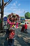 A street vendor selling rattles and other kids toys, Bangkok