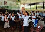 Students singing in classroom