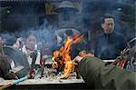 Worshipper burning the incense at Lonhua Temple, Shanghai