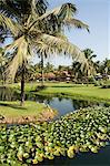 The garden and golf course at the Leela Hotel, Mobor, Goa, India, Asia