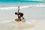 Beach surfing at Santa Maria on the island of Sal (Salt), Cape Verde Islands, Africa