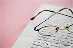 Still Life of Eyeglasses and Letter