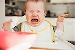 Crying Baby in High Chair