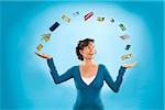 Woman juggling financial items