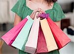 woman holding shopping bags