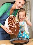 Mother and daughter cooking