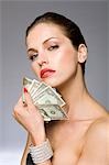 Female beauty model with money in hand