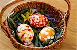 painted easter eggs in basket