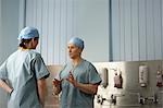 Medical staff in scrubs in discussion