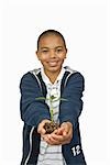 Boy Holding Sapling