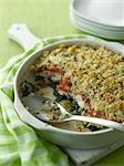 Baked Pickerel Casserole With Breadcrumbs, Tomato and Spinach