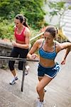 Women Running up Steps, Seattle, Washington, USA