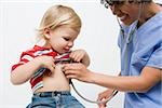 Toddler and nurse with stethoscope