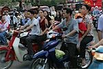 People on motobike on Nguyen Hue St,Ho Chi Minh City,Vietnam