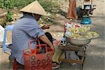Eine Obst-Verkäufer, My Tho, Vietnam