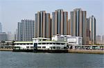 Hung Hom residential buildings with the ferry pier at the foreground,Hong Kong