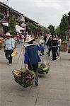 Peddler of vegetables at the Old town of Dali,Yunnan Province,China