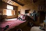 Bedroom Interior der Uyghur Leute Häuser, Dorf Tuyoq, Turfan, Xinjiang Uyghur Autonomie district, China