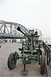 Sino-Korea Friendship Bridge on Yalu River with flak exhibited,Dandong,Liaoning Province,China