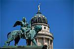 Statue and dome of French Cathedral, Gendarmenmarkt, Berlin, Germany, Europe