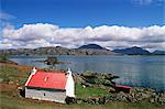 Red roofed cottage, Loch Torridon, Wester Ross, Highlands, Scotland, United Kingdom, Europe