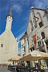 Old Town Hall spire and cafe, Tallinn, Estonia, Baltic States, Europe