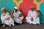 Three falconers with their birds at the Fantasia pour le moussen de Moulay Abdallah, El Jadida, Morocco, North Africa, Africa