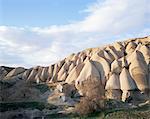 Undulating cliffs of soft volcanic ash, Uchisar, Cappadocia, Anatolia, Turkey, Eurasia