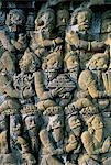 Detail of the carved friezes dating from the 8th century AD, Buddhist site of Borobudur, UNESCO World Heritage Site, Java, Indonesia, Southeast Asia, Asia