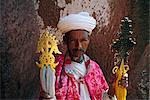 Portrait of a man holding Christian symbols,Gabriel and Raphael,Bieta Mercurios,Lalibela,Wollo region,Ethiopia,Africa