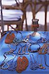 Necklaces on blue table,Essouira,Morocco,North Africa,Africa