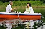 Older Couple In A Boat on a Lake