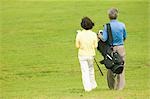 Older Couple Golfing