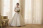 Japanese Bride Standing with Flower Bouquet