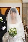 Bride Standing with Groom in Church