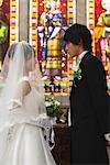 Bride Standing with Groom in Church