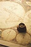 Compass and antique map