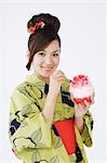 Japanese Woman Holding Ice Dessert