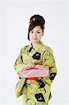 Woman in Kimono Holding Furoshiki