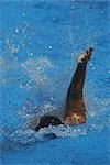 Swimmer doing backstroke